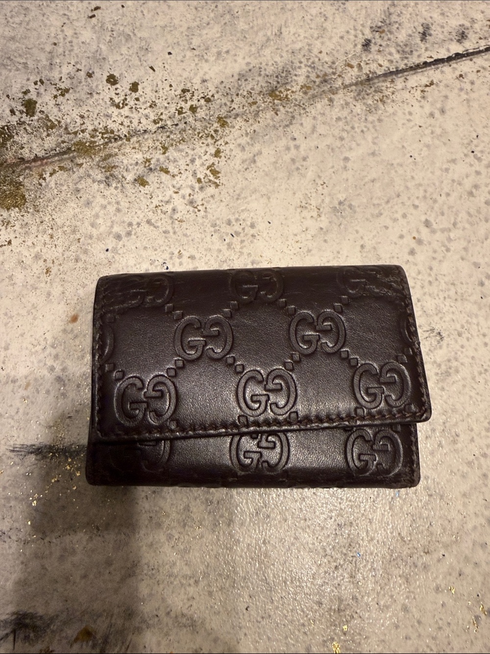 Gucci GG Embossed Leather Card Case in Dark Brown